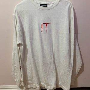 White IT shirt, light yellow staining around neck